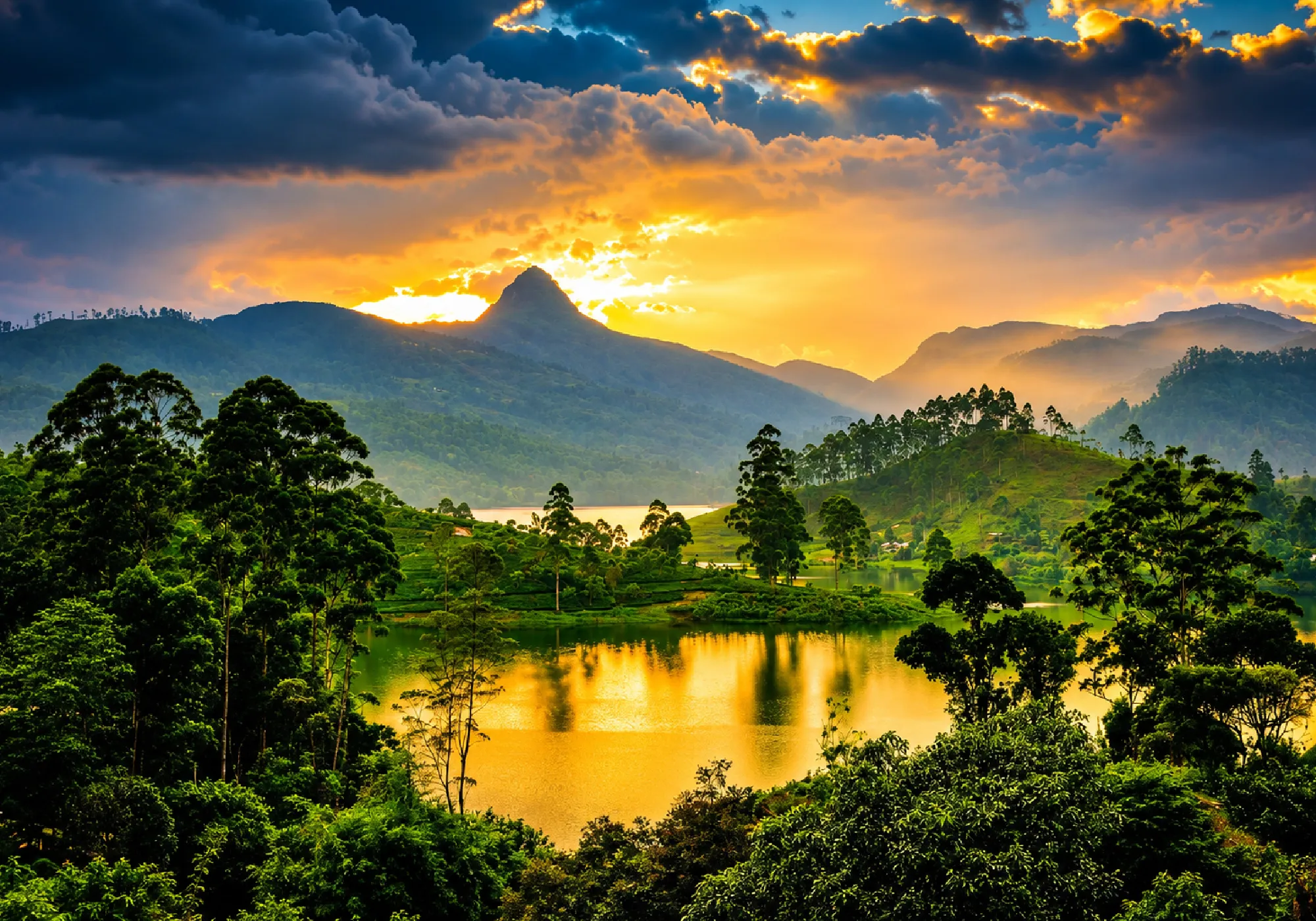 Sri Lanka mountain landscape with a scenic lake, lush green tea plantations, and a golden sunset over the hills.
